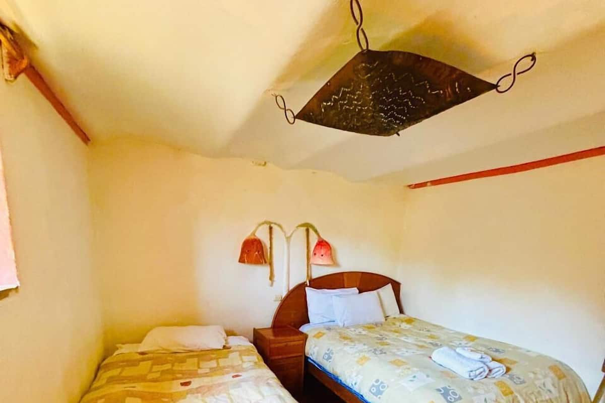 Superior Triple Room | 1 bedroom, hypo-allergenic bedding, down comforters, in-room safe