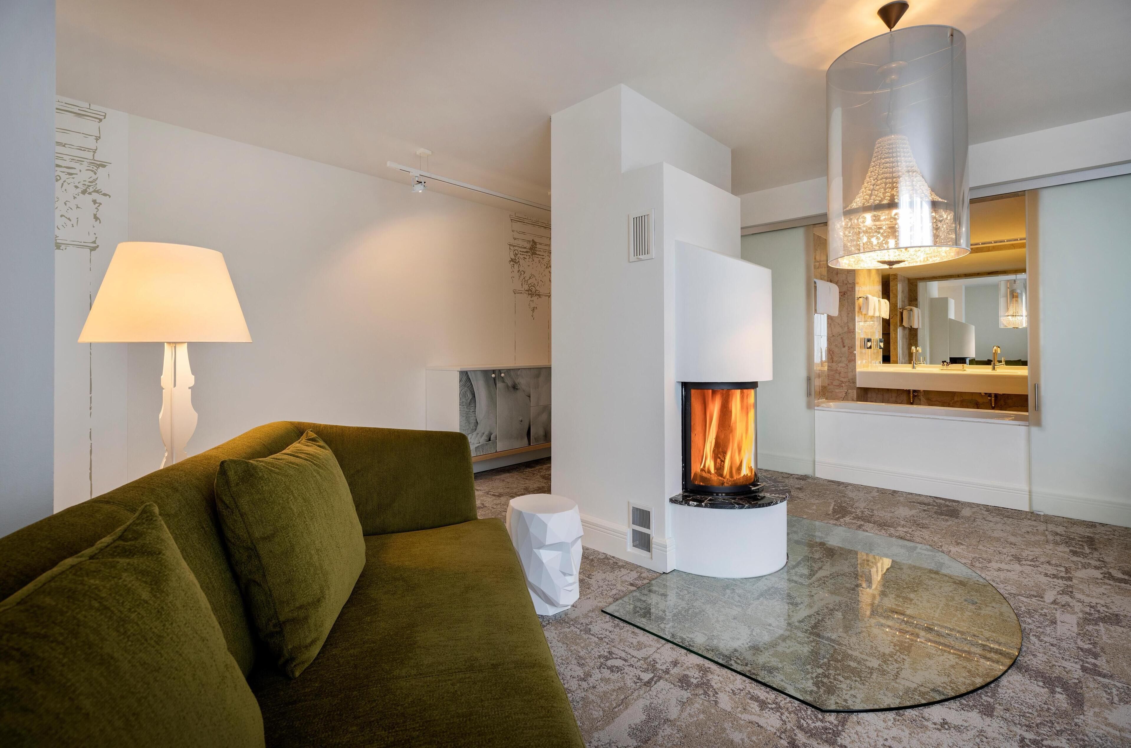 suite | in-room safe, desk, laptop workspace, blackout curtains