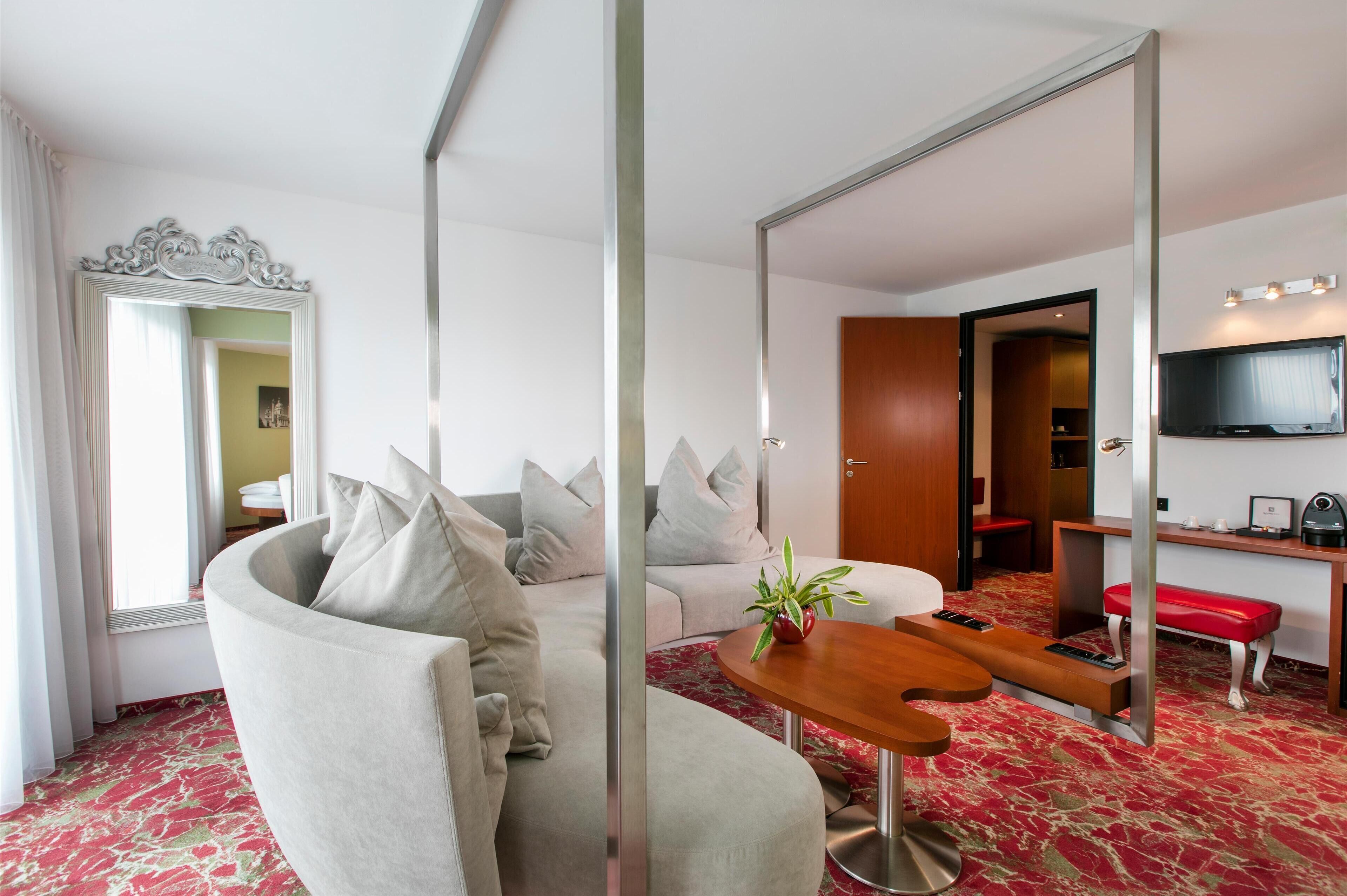 junior suite | in-room safe, desk, laptop workspace, blackout curtains