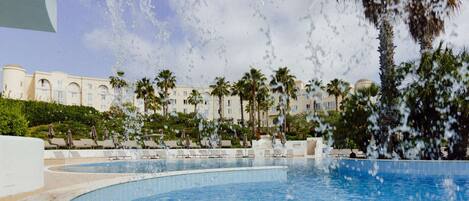 Seasonal outdoor pool, pool umbrellas, sun loungers