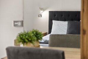 Deluxe Room | Desk, blackout drapes, iron/ironing board, cribs/infant beds