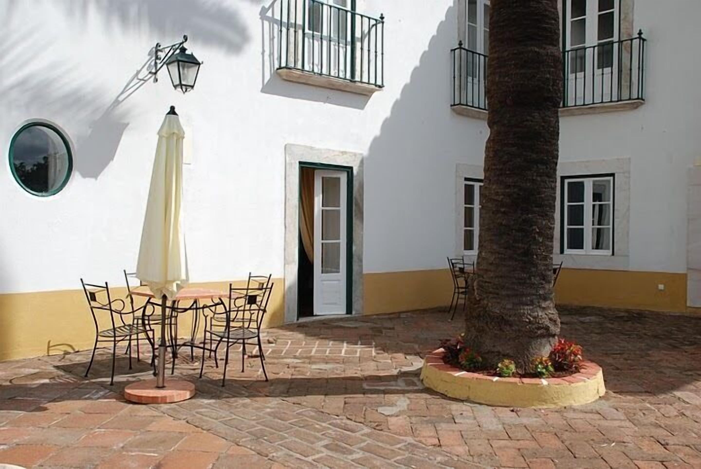 breakfast, lunch, dinner served; portuguese cuisine, garden views