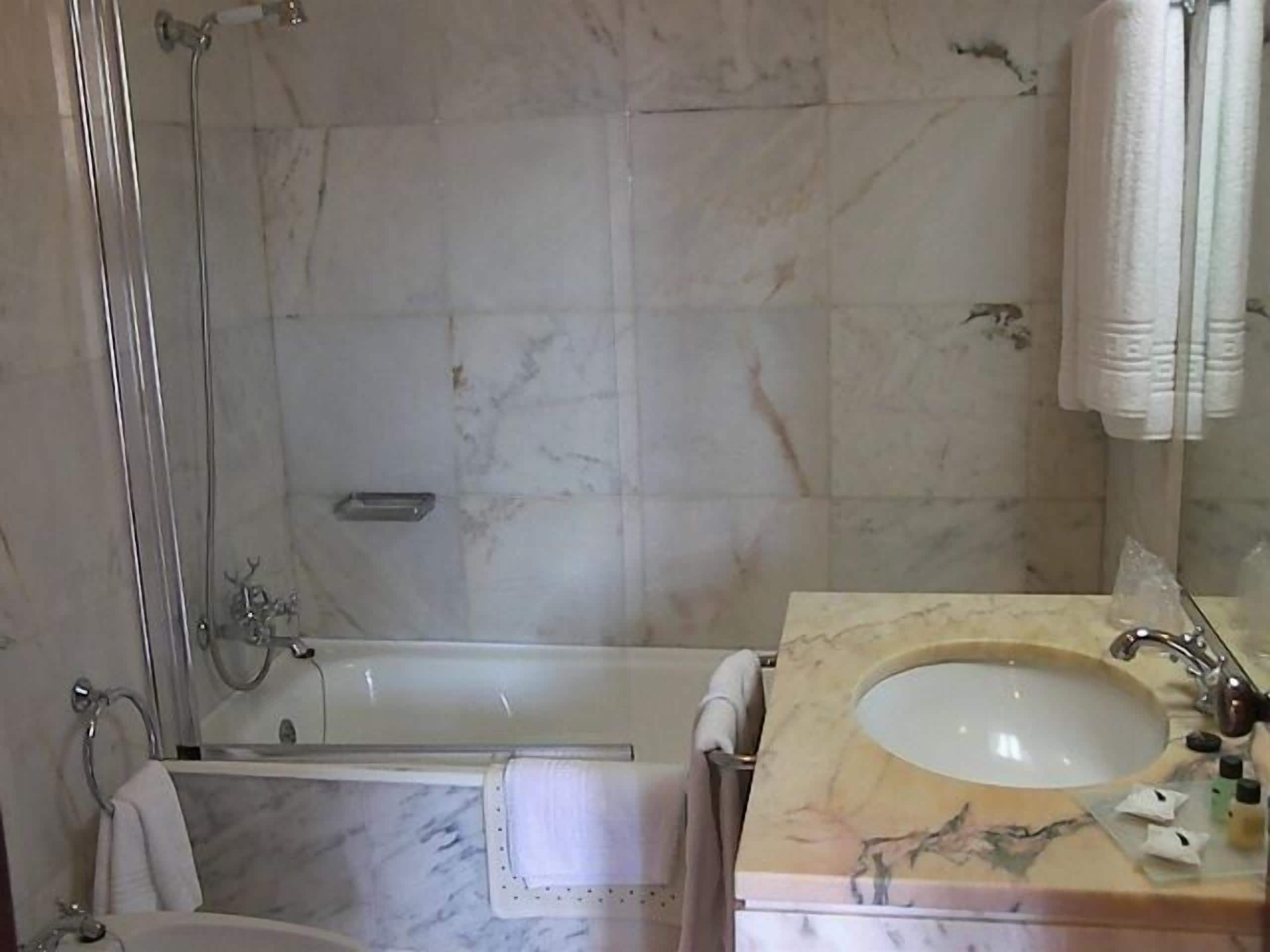 family double or twin room | bathroom amenities | combined shower/bathtub, free toiletries, hair dryer, bidet