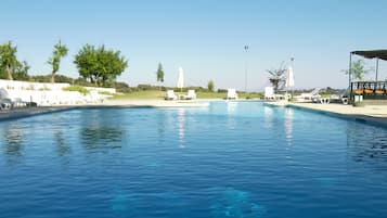 Seasonal outdoor pool, pool umbrellas, sun loungers