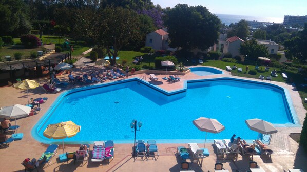 Outdoor pool, pool umbrellas, pool loungers