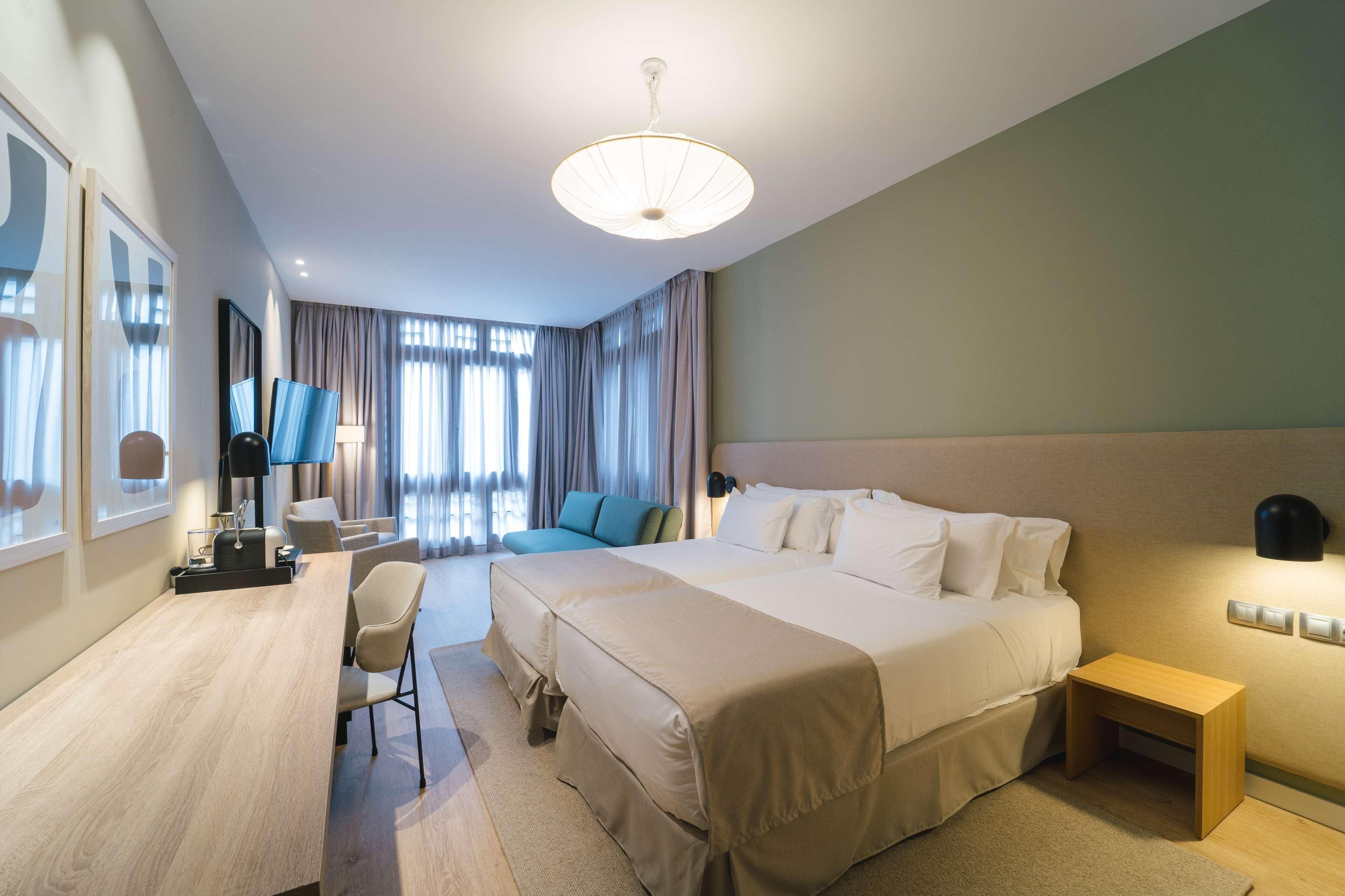 Premium bedding, memory foam beds, minibar, in-room safe