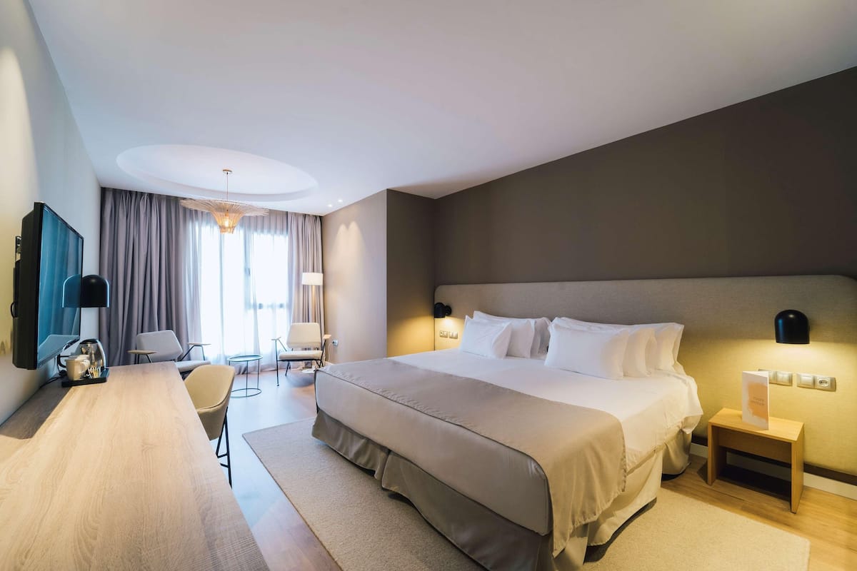 Premium bedding, memory foam beds, minibar, in-room safe