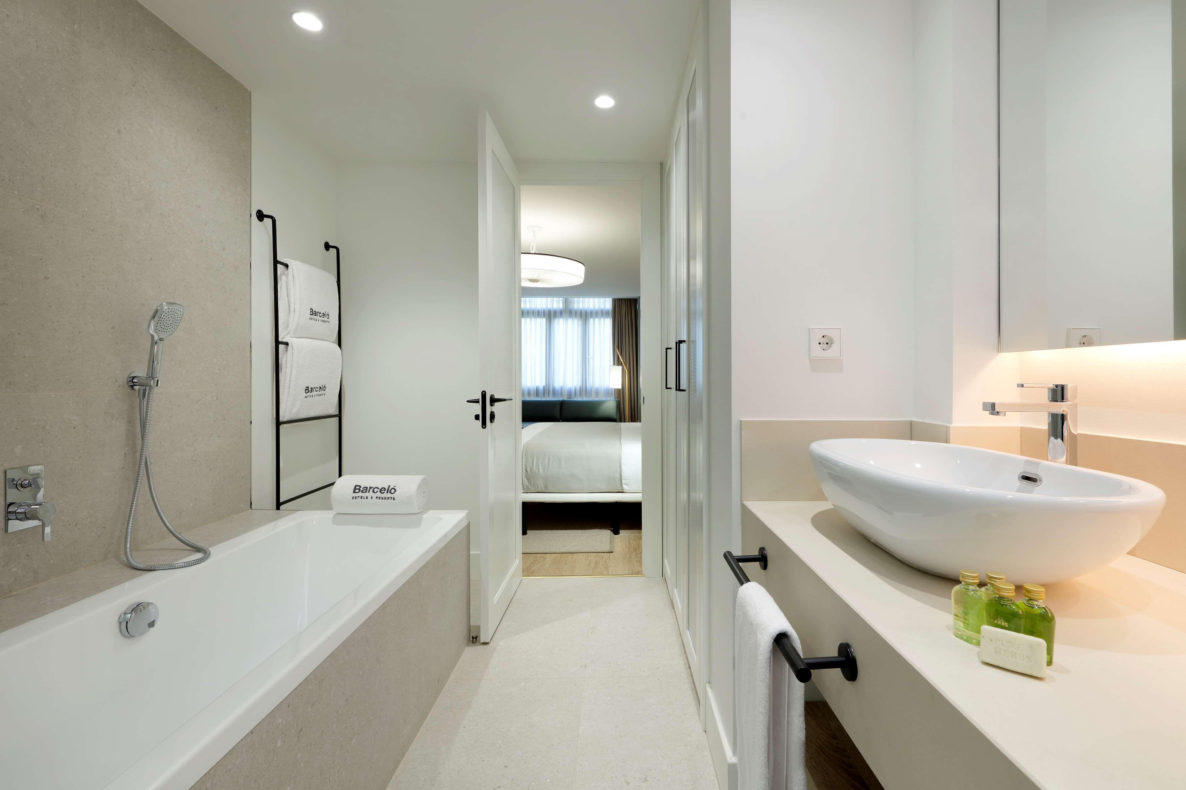 junior suite | bathroom | shower, rainfall showerhead, free toiletries, hair dryer