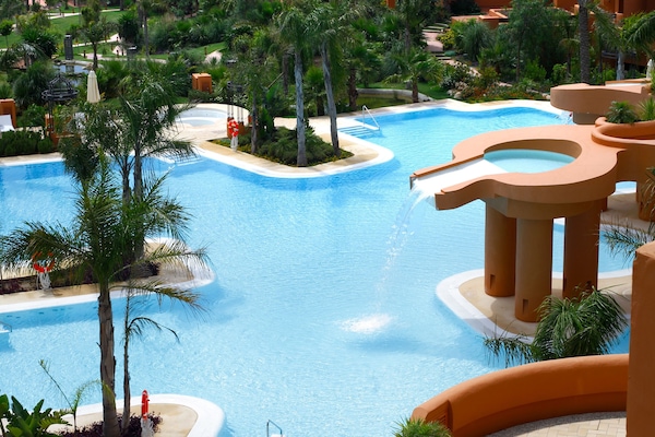 Indoor pool, 5 outdoor pools, pool umbrellas, pool loungers