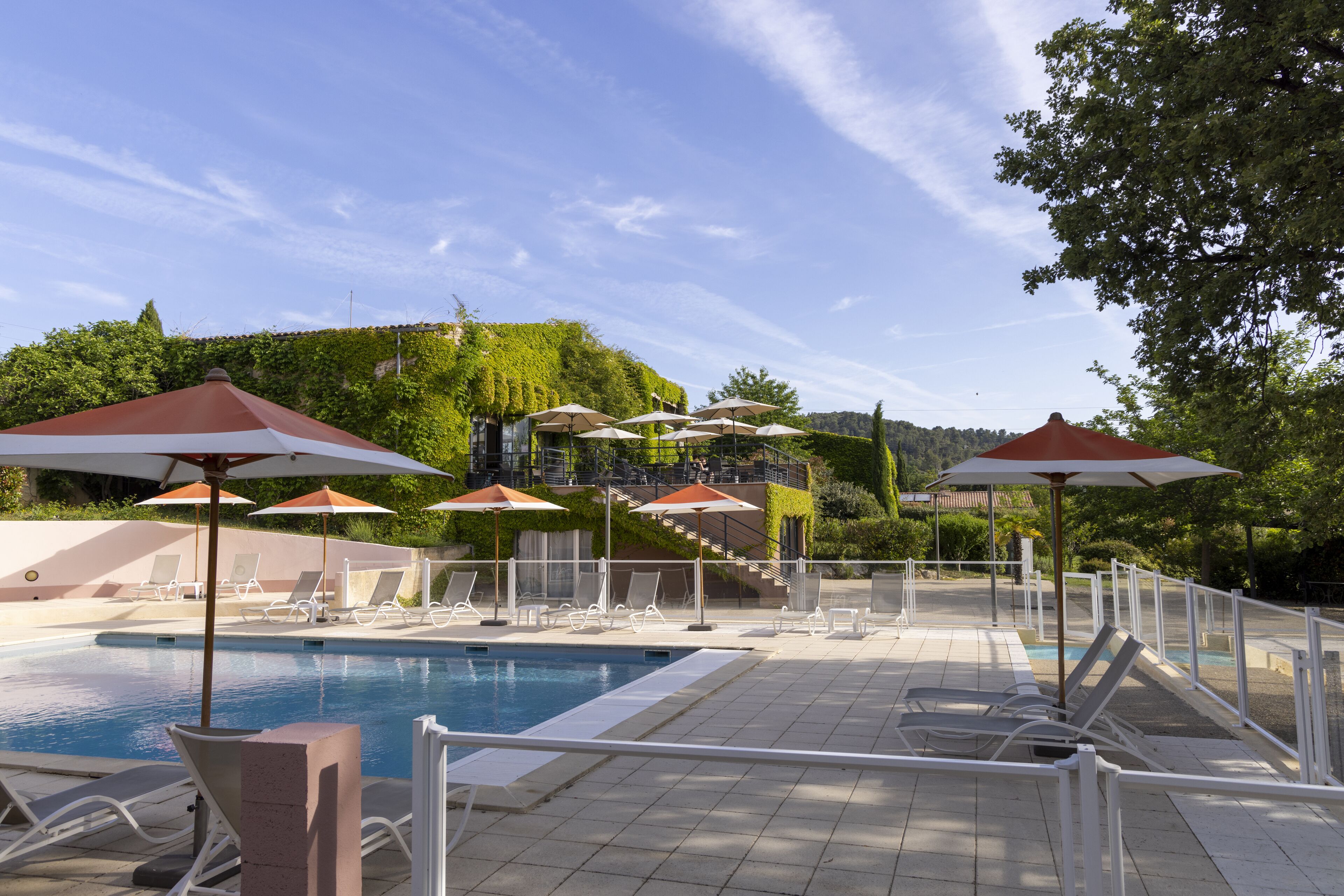 seasonal outdoor pool, open 9:00 am to 8:00 pm, pool umbrellas