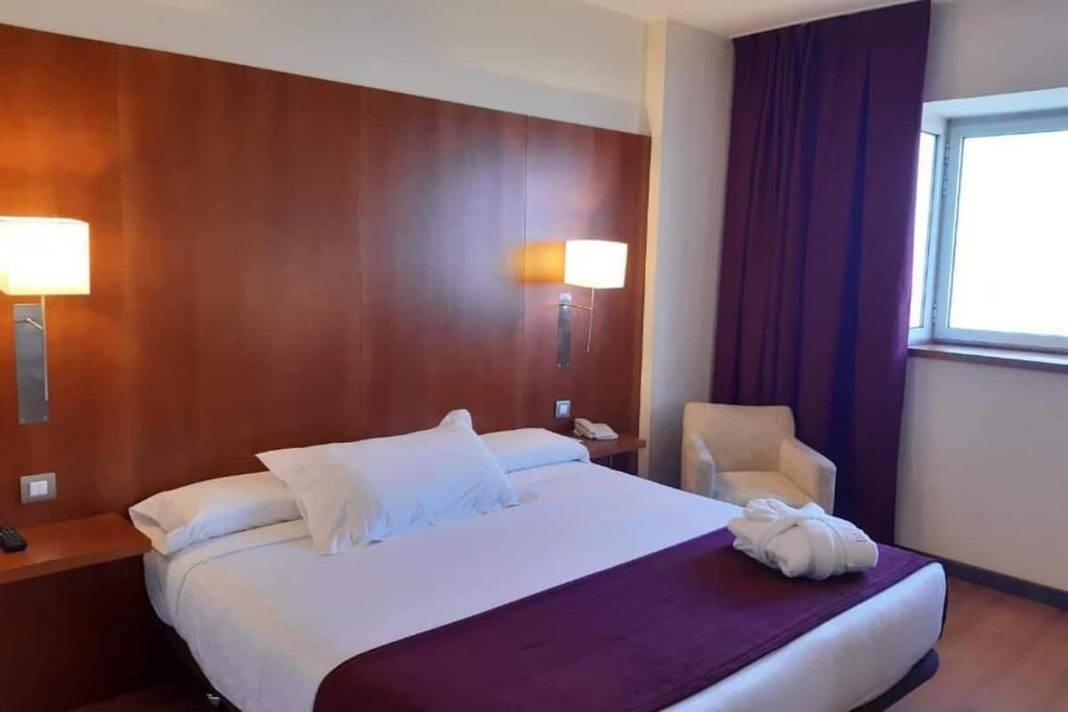 Select Comfort beds, minibar, in-room safe, desk