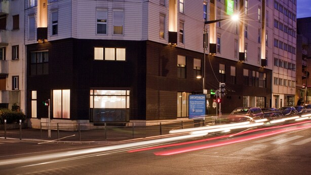A multi-story hotel with a prominent "HOTEL" sign at the top. - ibis Styles Paris Mairie de Montreuil (Montreuil)