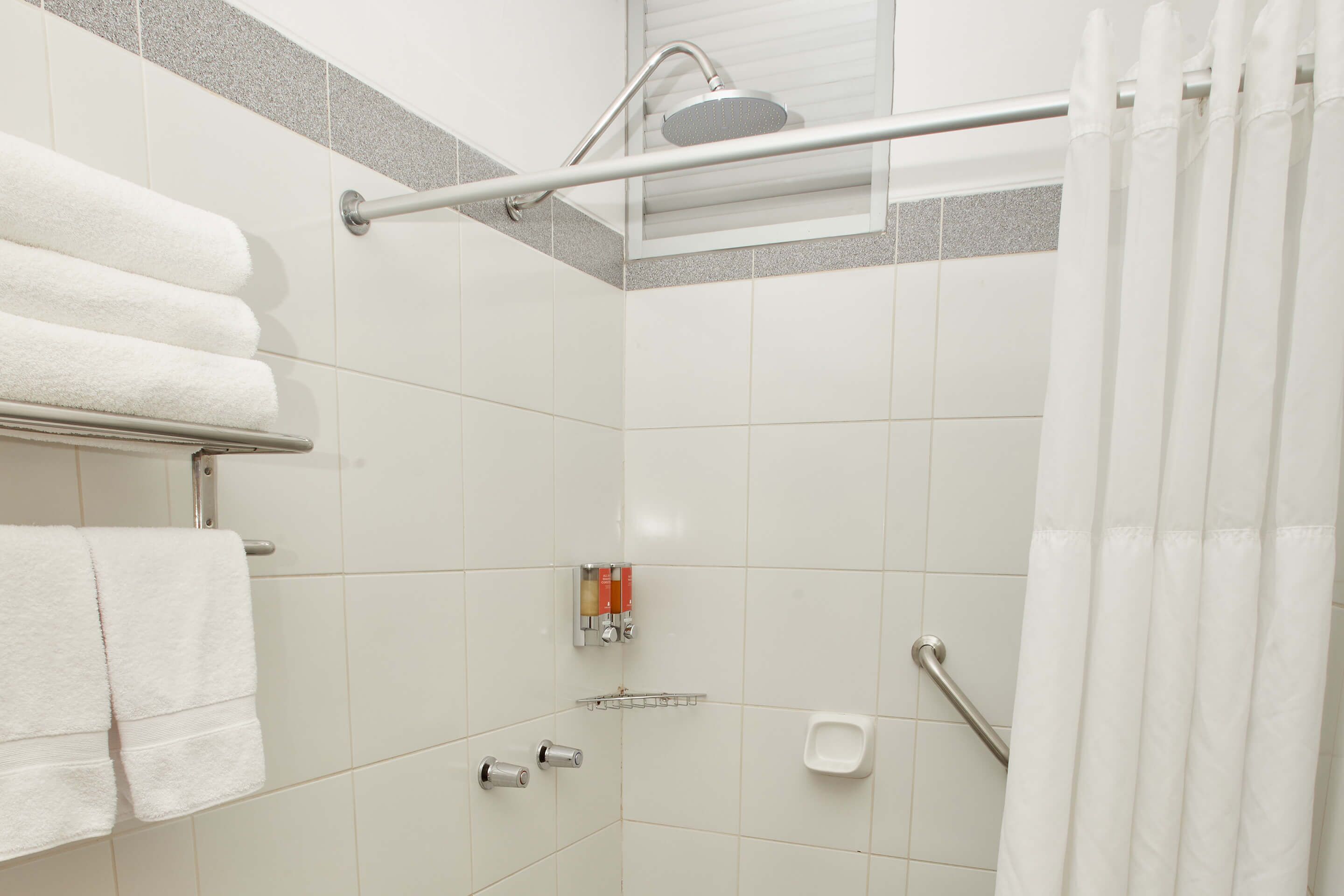 traditional room (3 twin beds) | bathroom | shower, free toiletries, hair dryer, towels