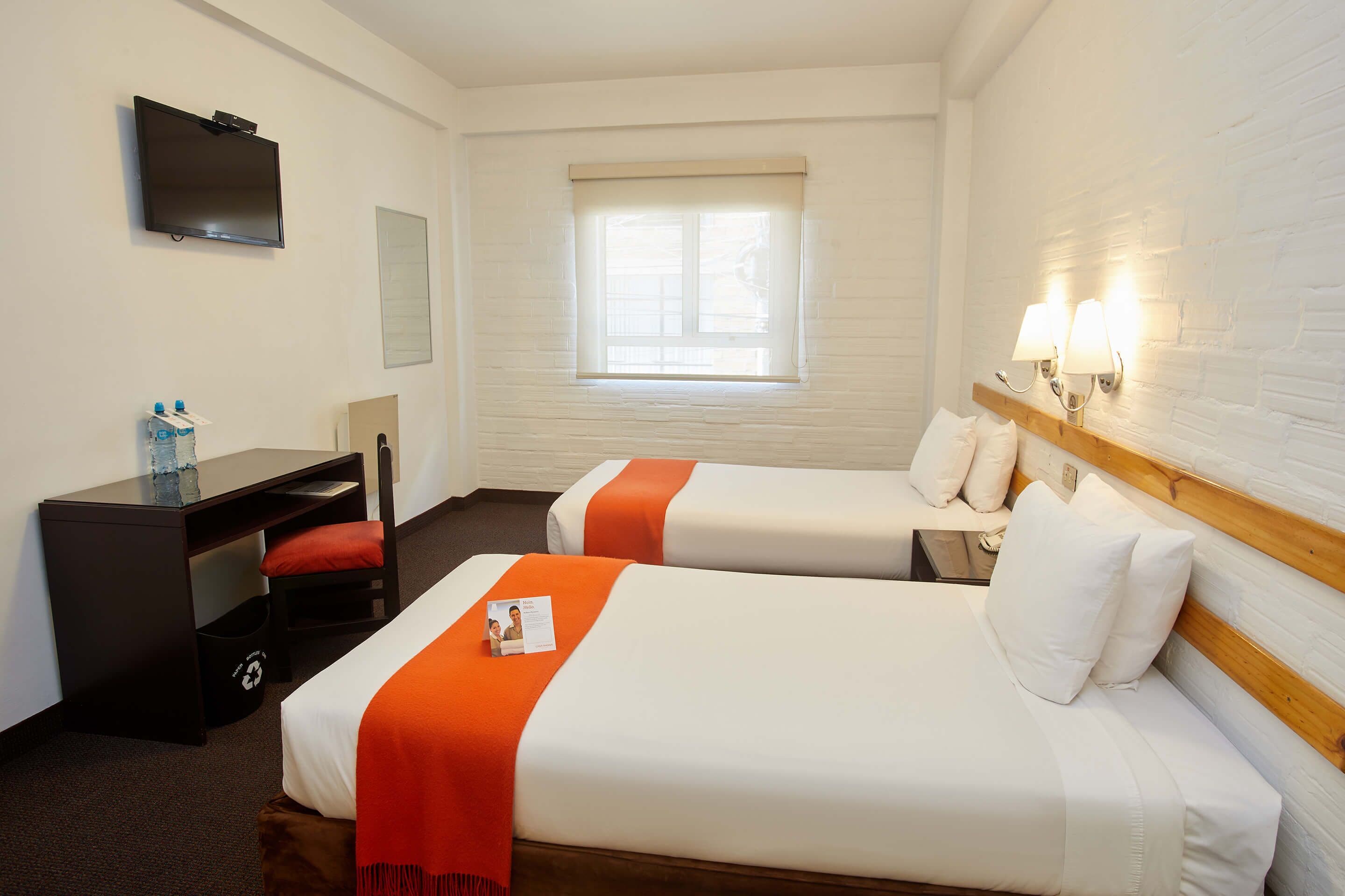 traditional room (2 twin beds) | 1 bedroom, premium bedding, in-room safe, desk