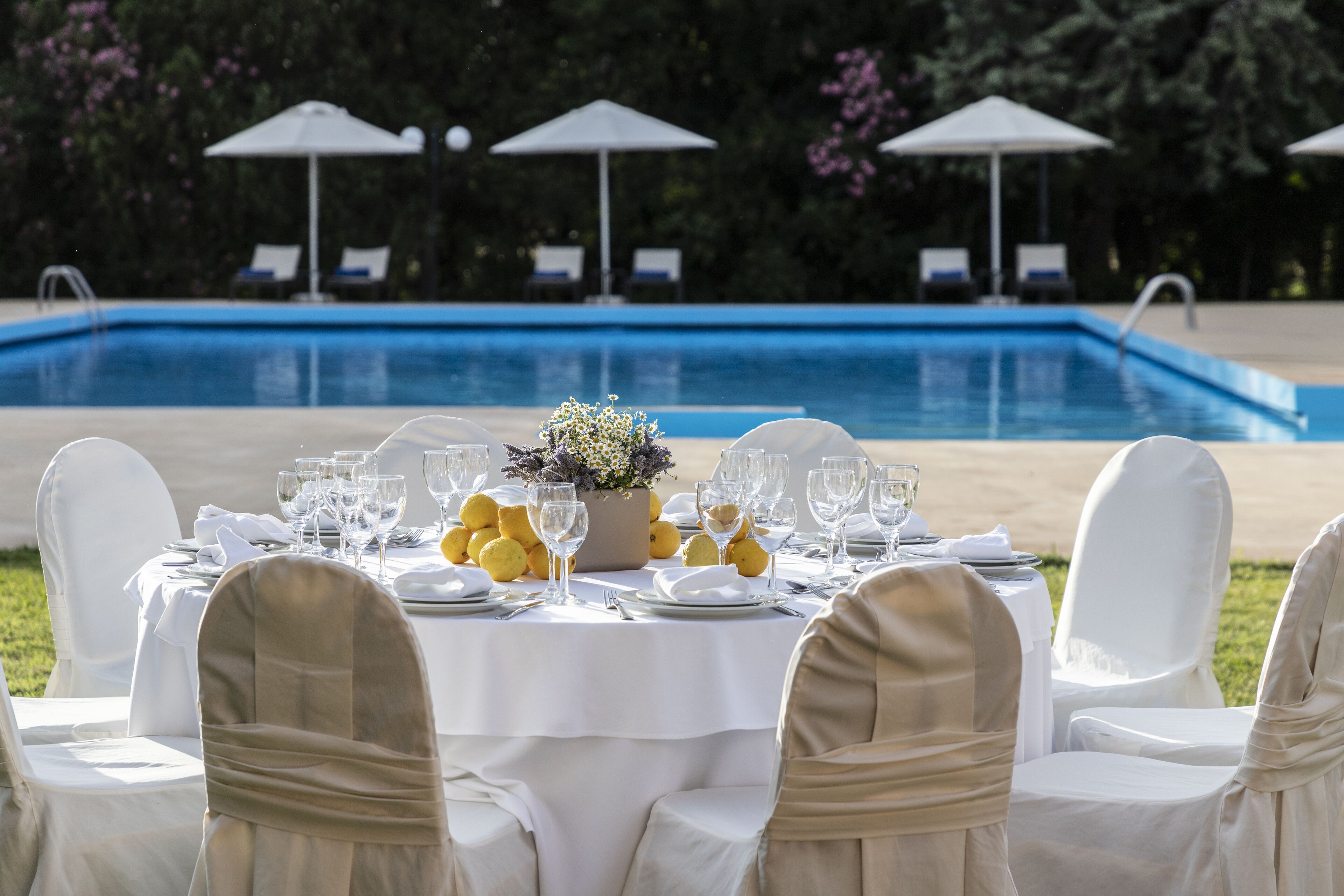 seasonal outdoor pool, pool umbrellas, pool loungers