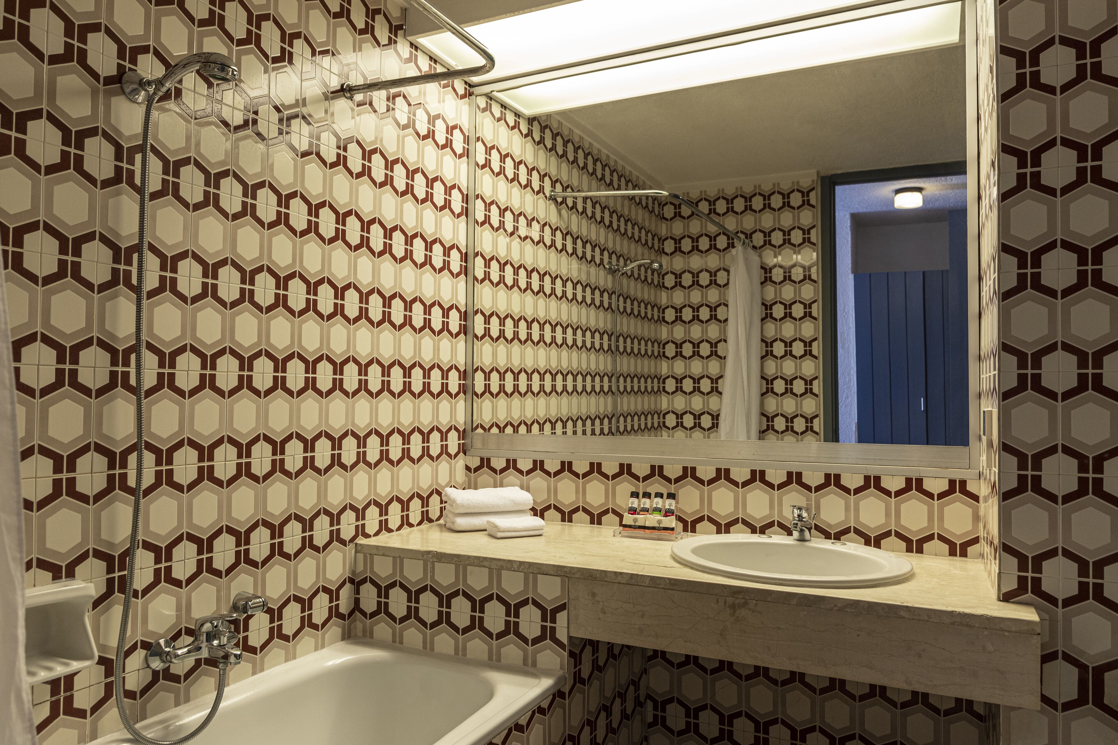 classic double room | bathroom | bathtub, free toiletries, hair dryer, towels