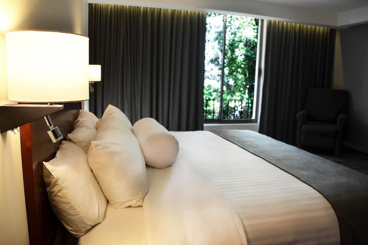 In-room safe, desk, blackout curtains, iron/ironing board