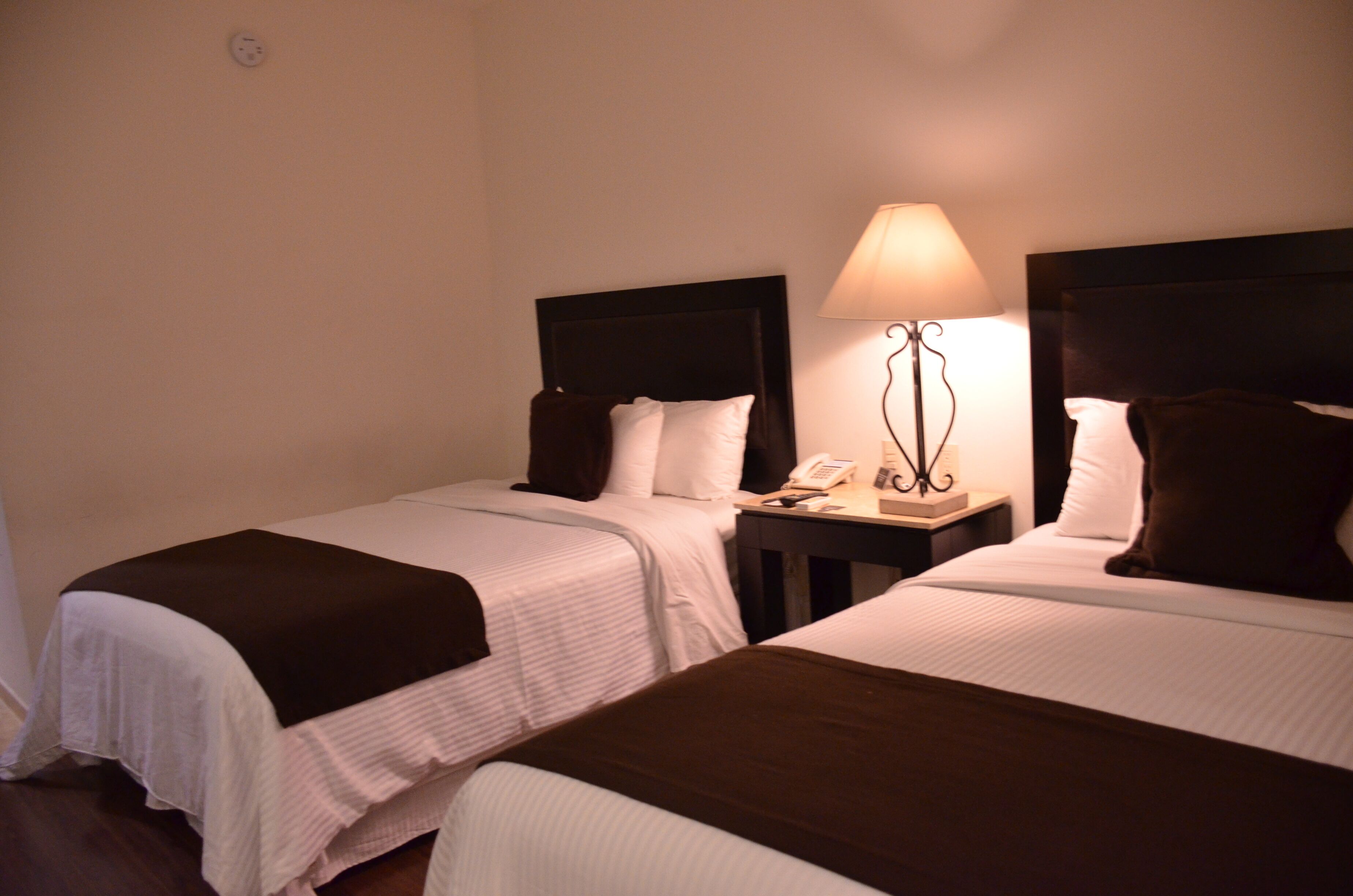 standard double room | in-room safe, desk, blackout curtains, iron/ironing board
