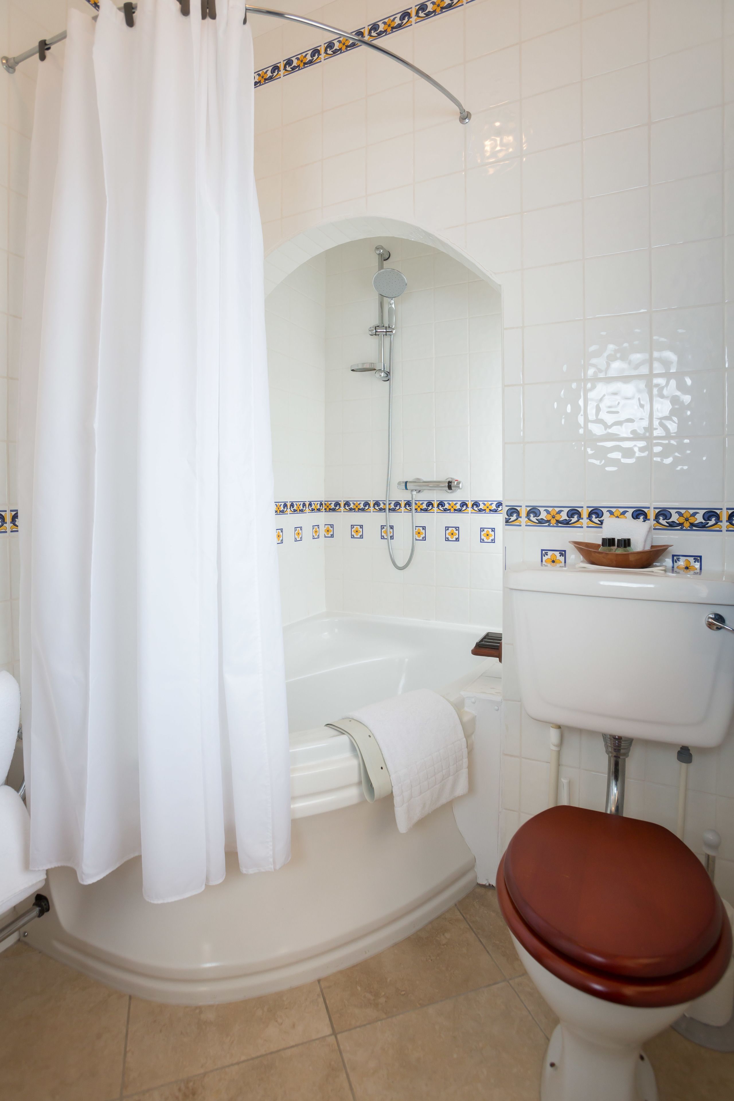 combined shower/bathtub, free toiletries, hair dryer, bathrobes