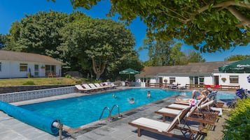 Seasonal outdoor pool, open 8 AM to 9 PM, pool loungers