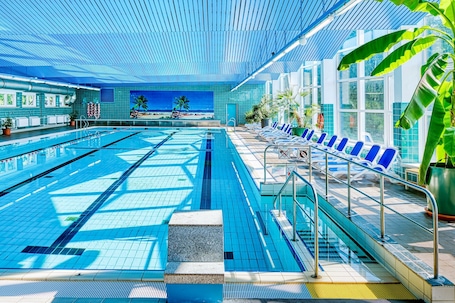 Indoor pool, seasonal outdoor pool, pool umbrellas, sun loungers