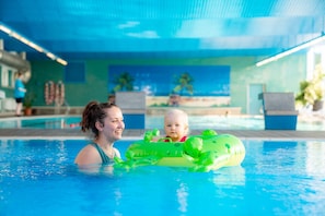 Indoor pool, seasonal outdoor pool, pool umbrellas, pool loungers