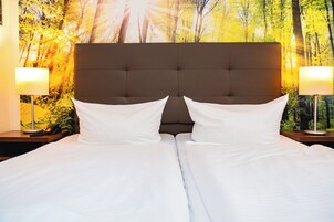 Habitación clásica (Plus) | Caja fuerte, cortinas opacas, wifi gratis y ropa de cama