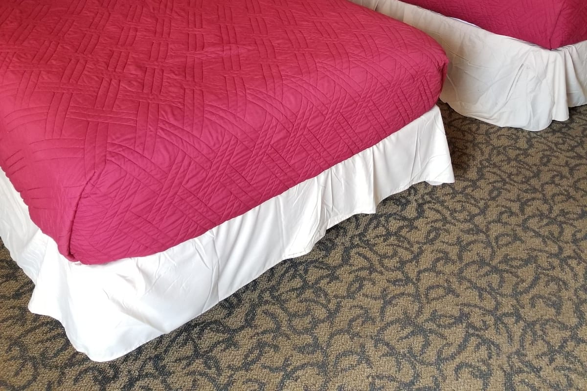 Economy Room, 2 Double Beds | Desk, blackout curtains, free WiFi, individually decorated