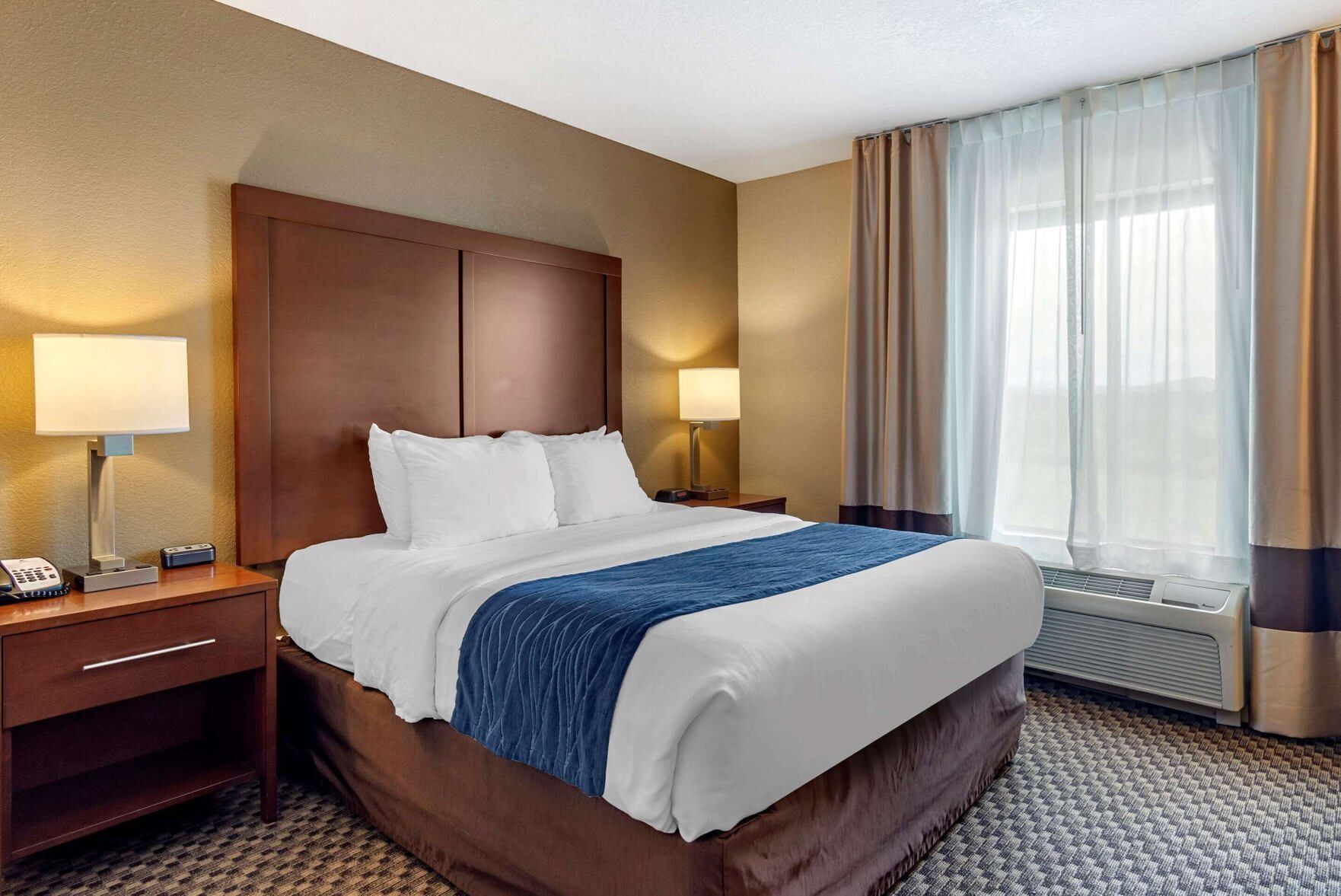 Desk, blackout drapes, iron/ironing board, free cribs/infant beds