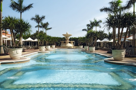 4 outdoor pools, open 8:00 AM to 8:00 PM, cabanas (surcharge)