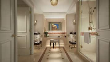 Separate bathtub and shower, free toiletries, hair dryer, bathrobes