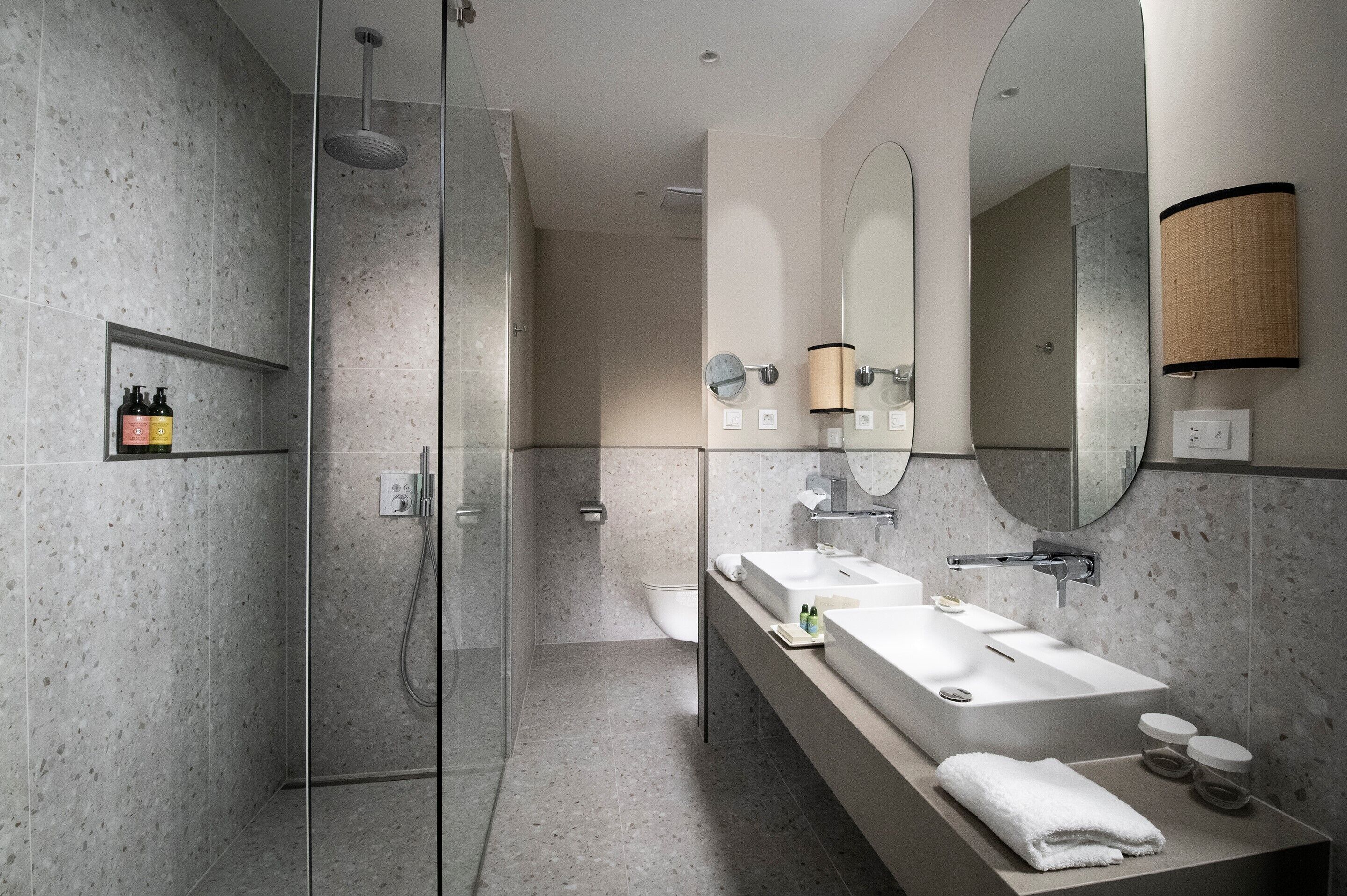 signature suite, terrace, city view | bathroom | eco-friendly toiletries, hair dryer, towels, soap