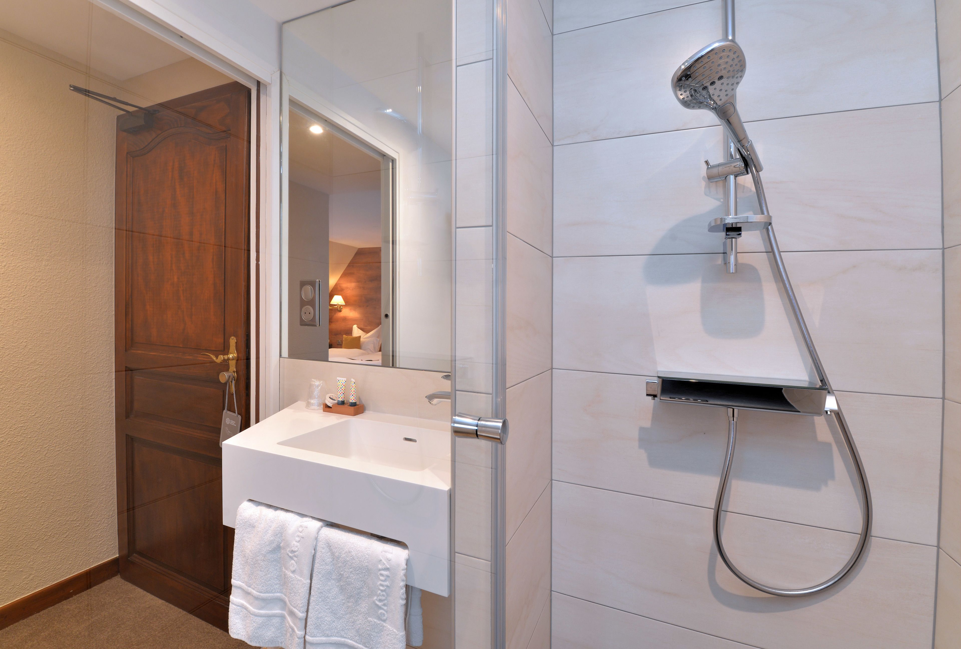 classic room | bathroom | hair dryer, towels, soap, shampoo