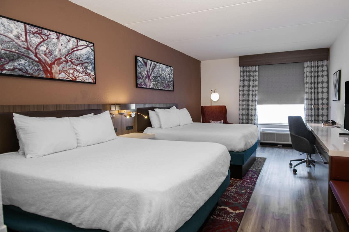 Room, 2 Queen Beds | 1 bedroom, down comforters, in-room safe, blackout drapes