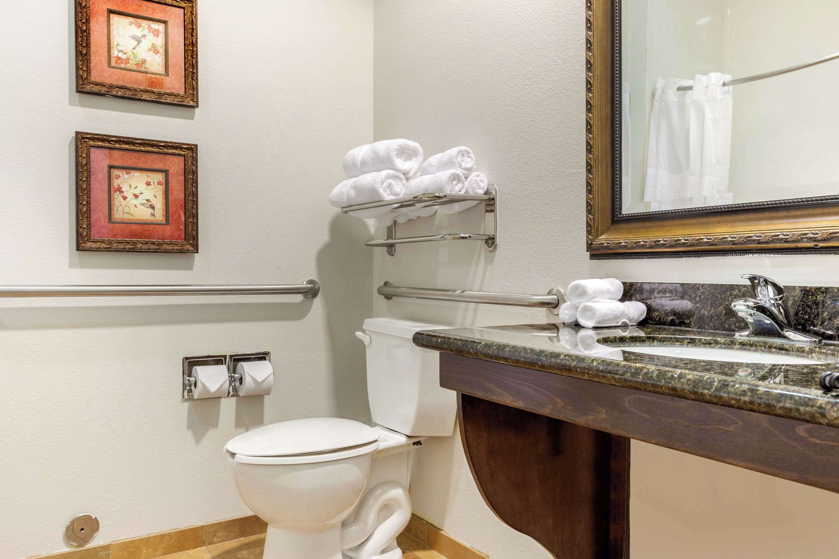 premium bedding, pillow-top beds, desk, laptop workspace