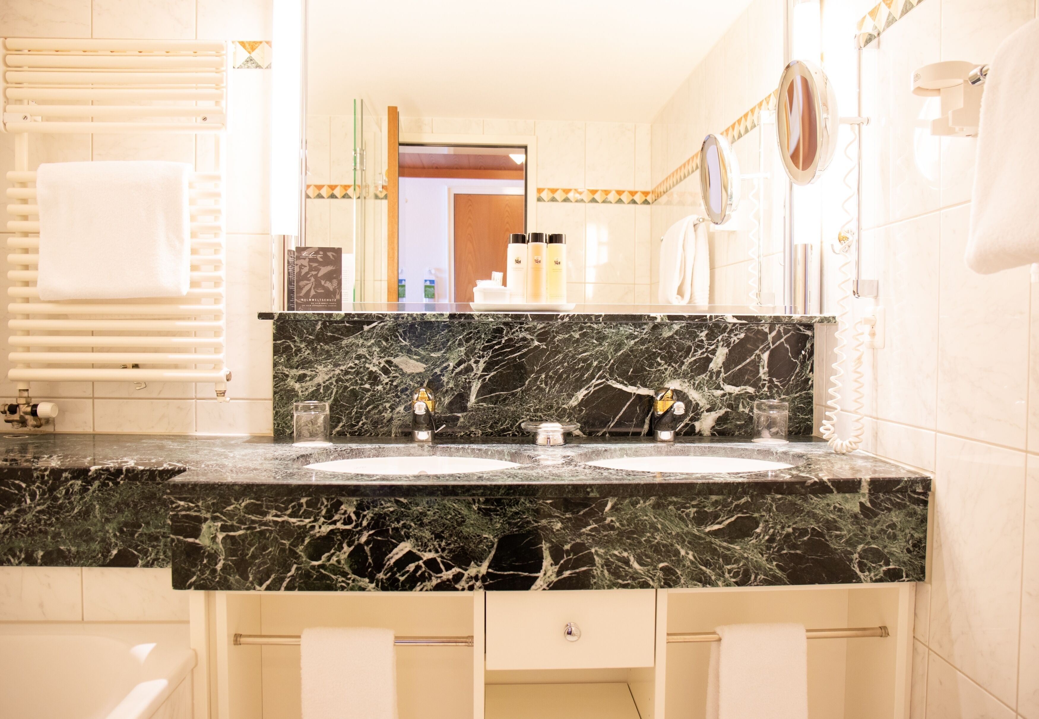 combined shower/bathtub, free toiletries, hair dryer, bathrobes