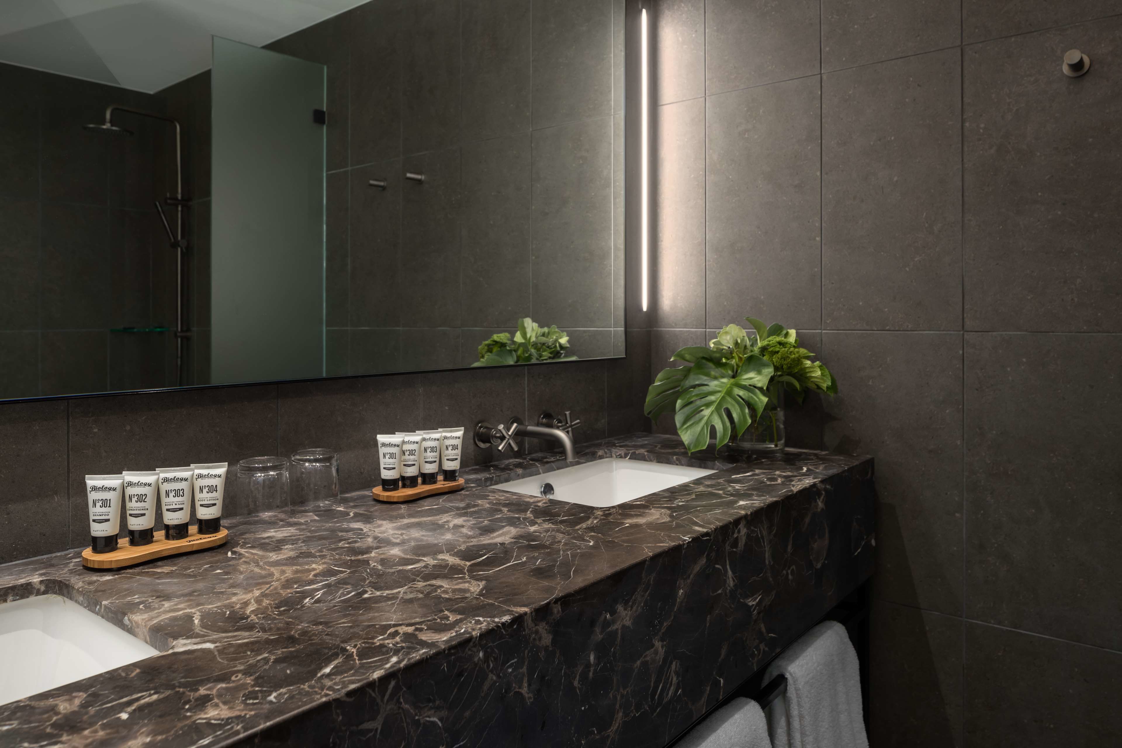 courtyard balcony room  | bathroom | shower, eco-friendly toiletries, hair dryer, towels