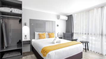 Deluxe Queen Studio | Pillowtop beds, desk, laptop workspace, iron/ironing board