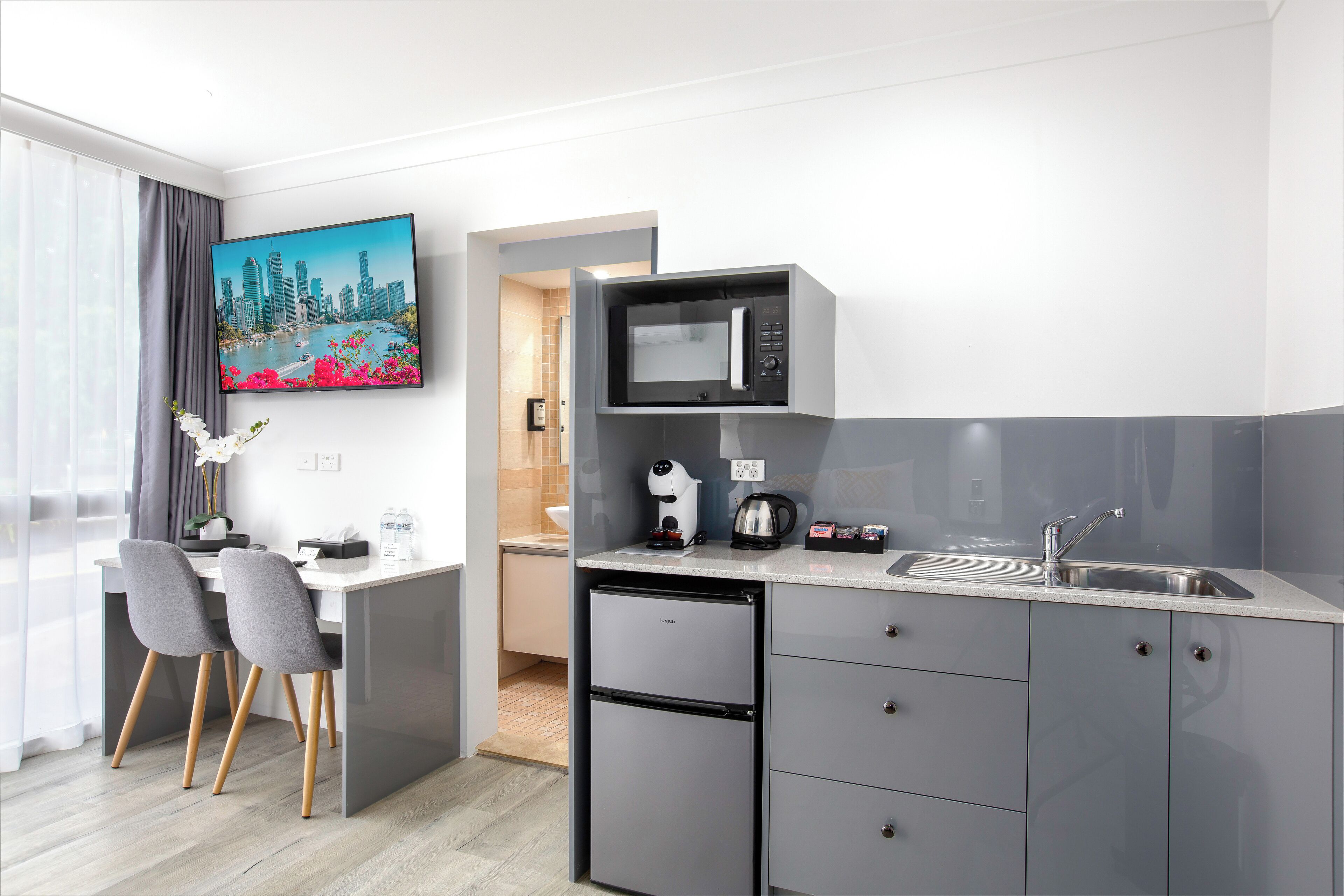 Deluxe Studio, 1 Queen Bed, Non Smoking | Pillow-top beds, desk, laptop workspace, iron/ironing board