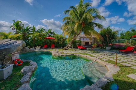 Outdoor pool, sun loungers. A Stone's Throw Away