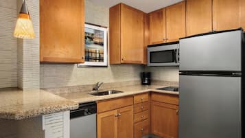 Studio, 1 King Bed with Sofa bed | Private kitchen | Full-size fridge, microwave, stovetop, coffee/tea maker