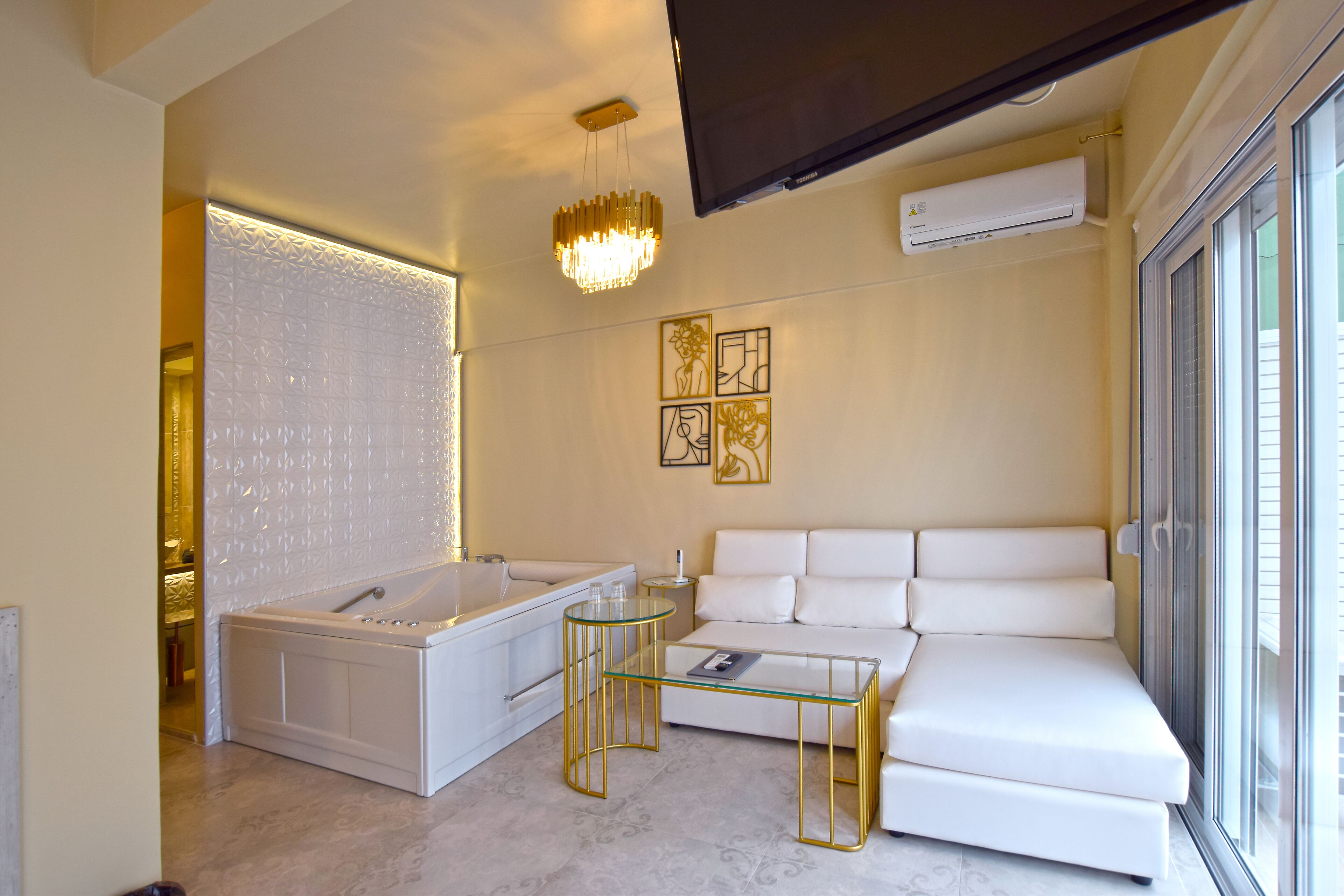 luxury studio suite | living area | 50-inch smart tv with digital channels