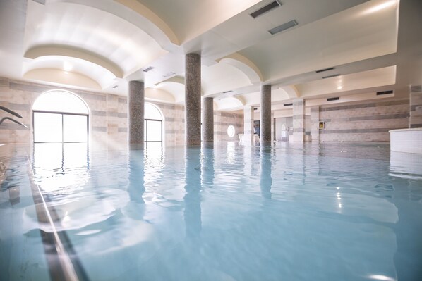 Indoor pool, seasonal outdoor pool, pool umbrellas, sun loungers