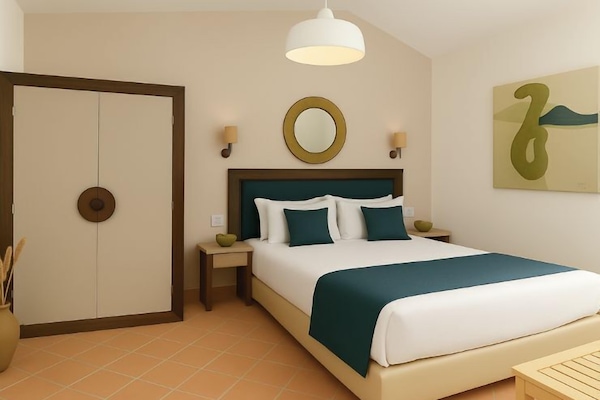 Dependance | Minibar, in-room safe, desk, blackout drapes