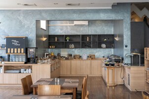 Free daily self-serve breakfast