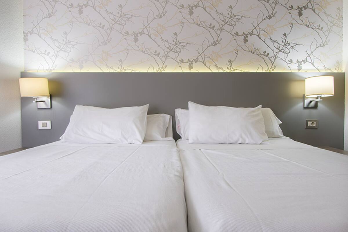 1 bedroom, desk, blackout curtains, iron/ironing board (on request)