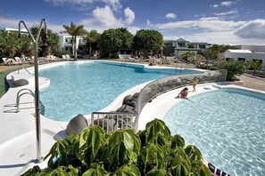 3 outdoor pools, pool umbrellas, pool loungers