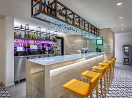 Rooftop bar, pool views, open daily