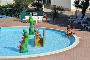 2 outdoor pools, open 9 AM to 7:00 PM, pool umbrellas, sun loungers