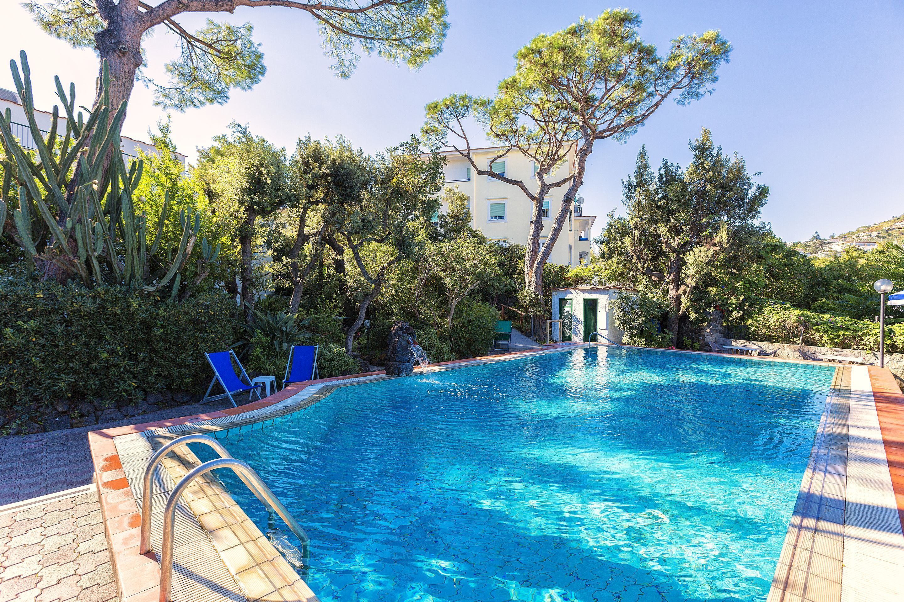 2 outdoor pools, pool umbrellas, pool loungers